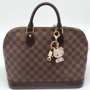 Louis Vuitton Gold Lock 🔒 Authentic LV Key + Unbranded Hello Kitty Bag Charm